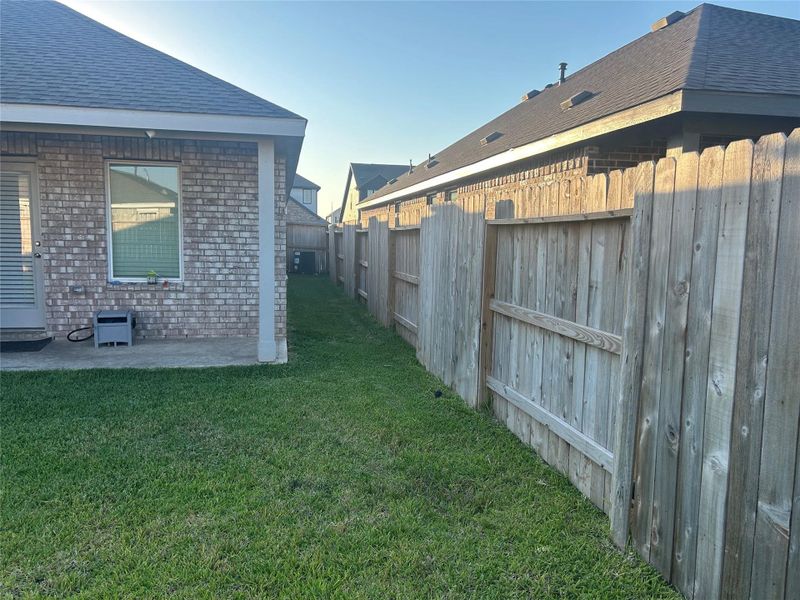 This is a view of the side yard from back. This is a view of the side yard from back.