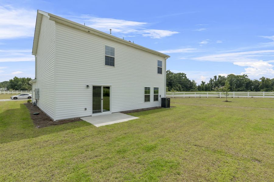Representative exterior photo of a completed home built from the Myrtle A by McGuinn Homes in Crystal Downs, Sumter, SC (Image 22).