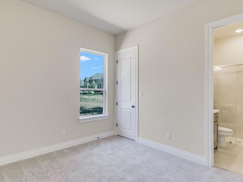 Bedroom #3 features an en-suite bathroom with walk-in shower.