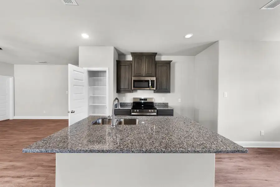 Furnished interior view inside a new home in Stonecreek, Sulphur Springs (Image 5).
