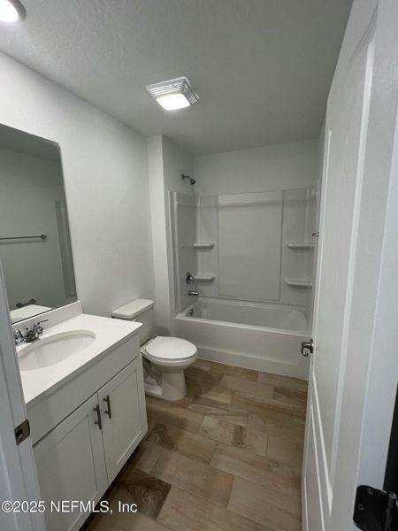 Furnished interior view inside a new home in American Village, Palm Coast (Image 8).