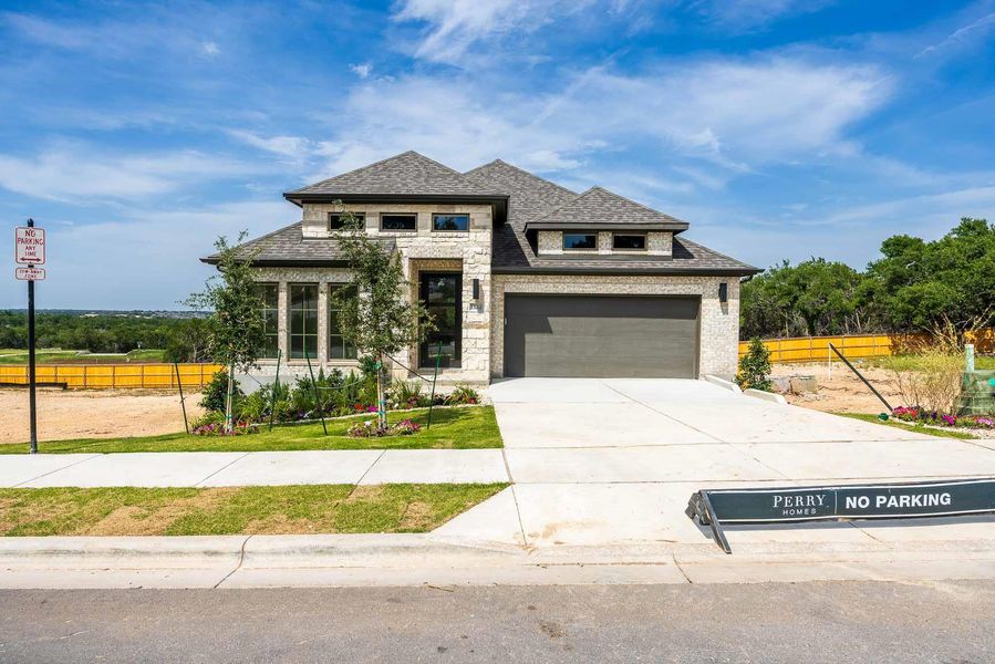 View of front of house with fence, a shingled roof, driveway, and a garage View of front of house with fence, a shingled roof, driveway, and a garage