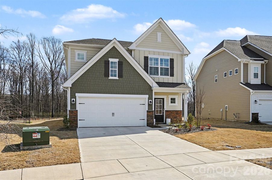 Front exterior of a new home in Summerlyn Village, Kannapolis, NC, highlighting curb appeal (Image 21).