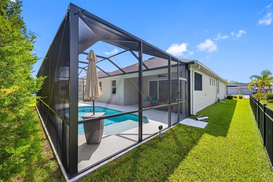 Exterior details and patio area of a home in , Parrish (Image 4).
