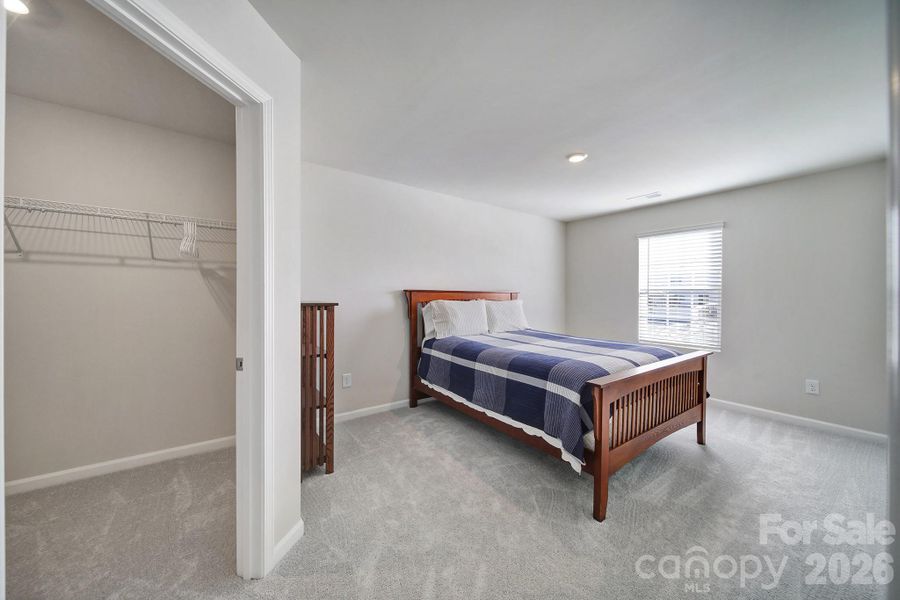 Guest Bedroom 1 with walk-in closet