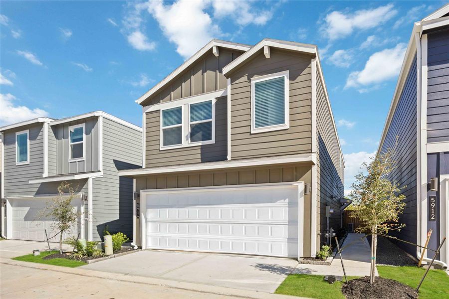 Front exterior of a new home in Mansfield Estates, Houston, TX, highlighting curb appeal (Image 2). Front exterior of a new home in Mansfield Estates, Houston, TX, highlighting curb appeal (Image 2).