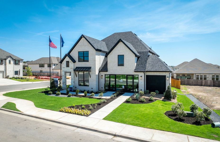 Representative exterior photo of a completed home built from the Garwood by Pulte Homes in Crescent Bluff, Georgetown, TX (Image 29). Representative exterior photo of a completed home built from the Garwood by Pulte Homes in Crescent Bluff, Georgetown, TX (Image 29).