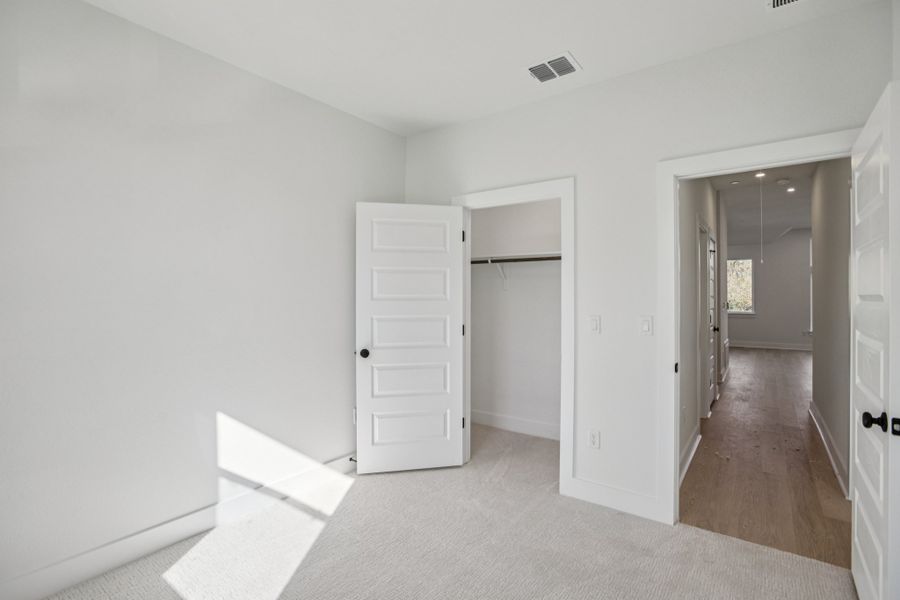 Spacious, unfurnished interior of a new home in Koenig Townhomes, Austin (Image 20).