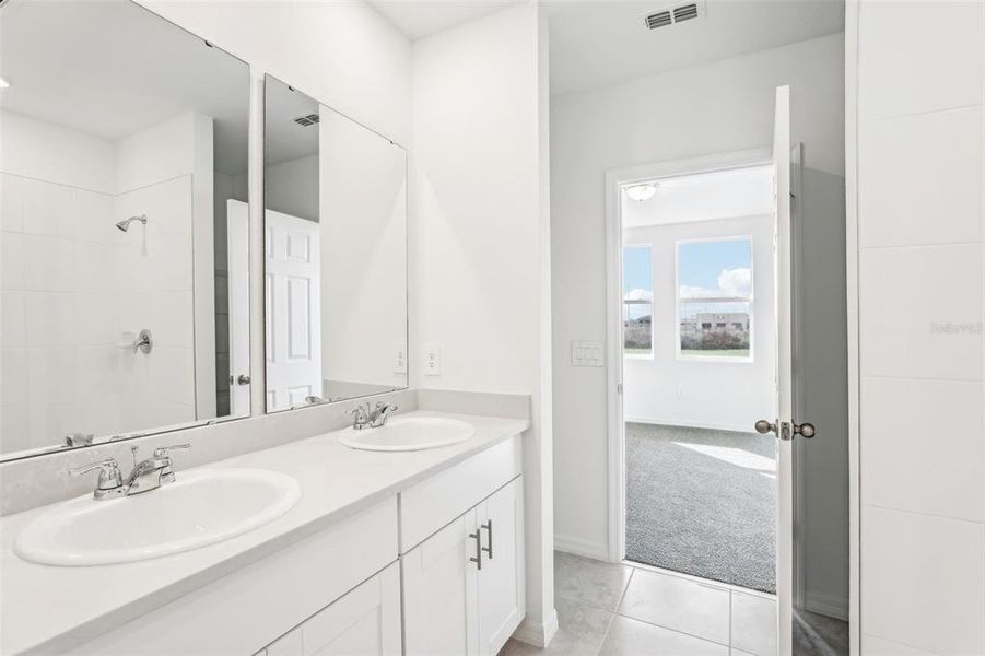 Furnished interior view inside a new home in Lake Deer Estates - Classic Series, Poinciana (Image 11).