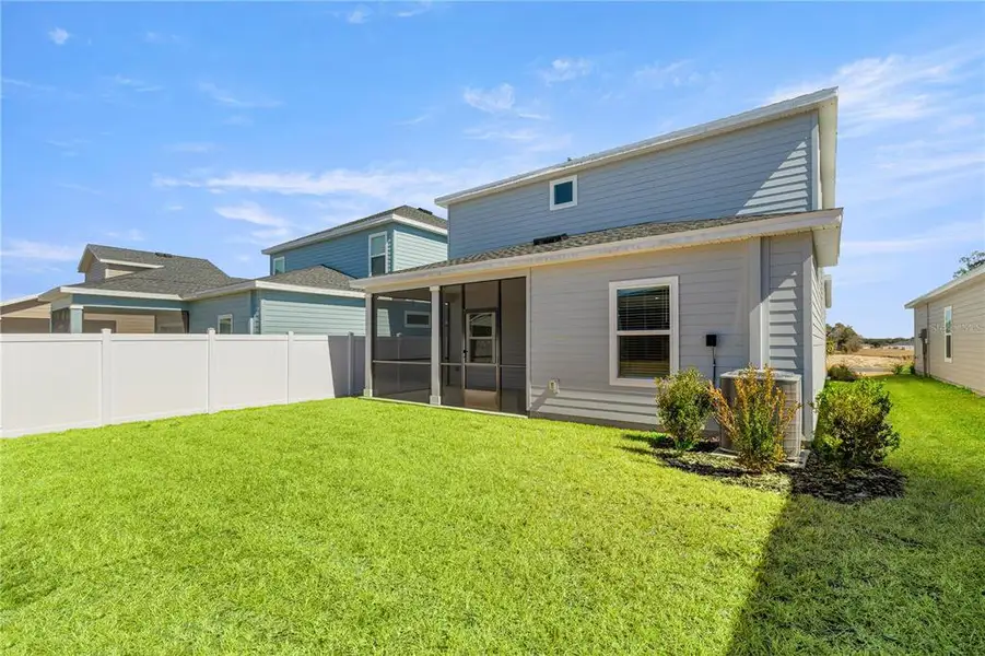 Exterior details and patio area of a home in Pioneer Ranch, Ocala (Image 3).