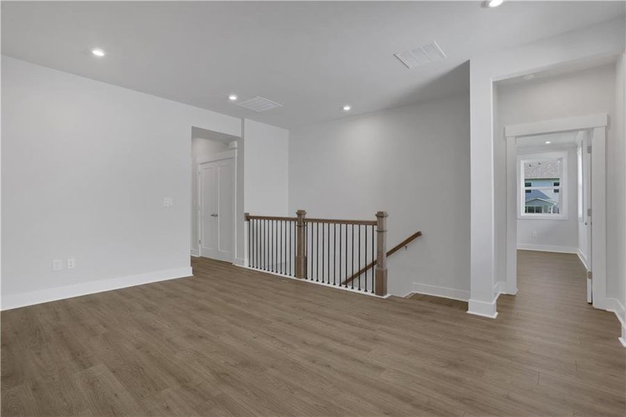 Spacious, unfurnished interior of a new home in The Paddocks at Doc Hughes, Buford (Image 38).