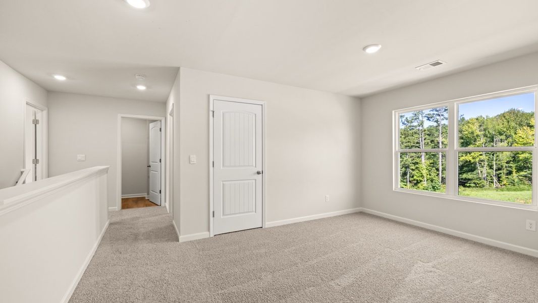 Representative unfurnished interior of a home built from the Hayden by D.R. Horton in Fairhaven, Lithia Springs (Image 24).