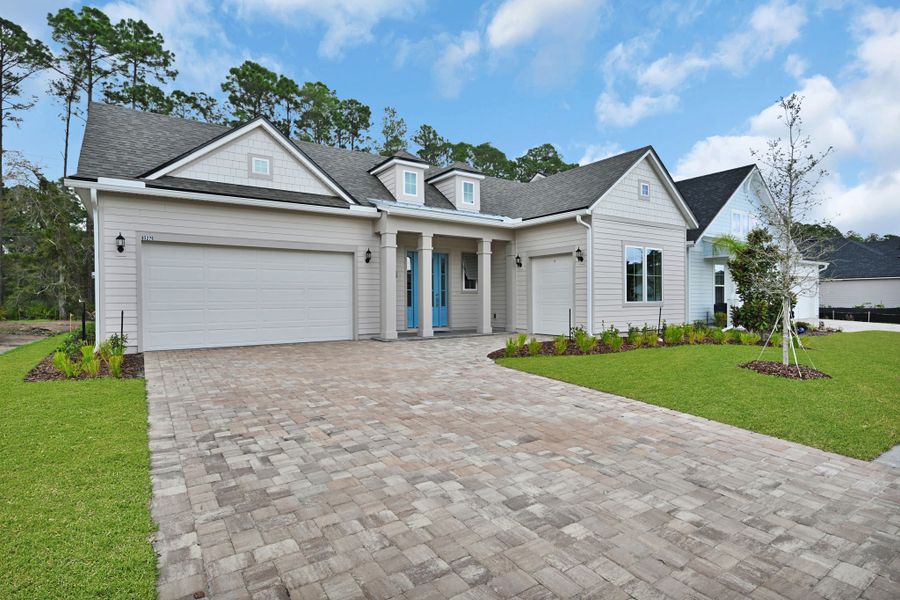 Representative exterior photo of a completed home built from the Hudson II by Riverside Homes in Hidden Creek at SilverLeaf 70' Series, St. Augustine, FL (Image 23).
