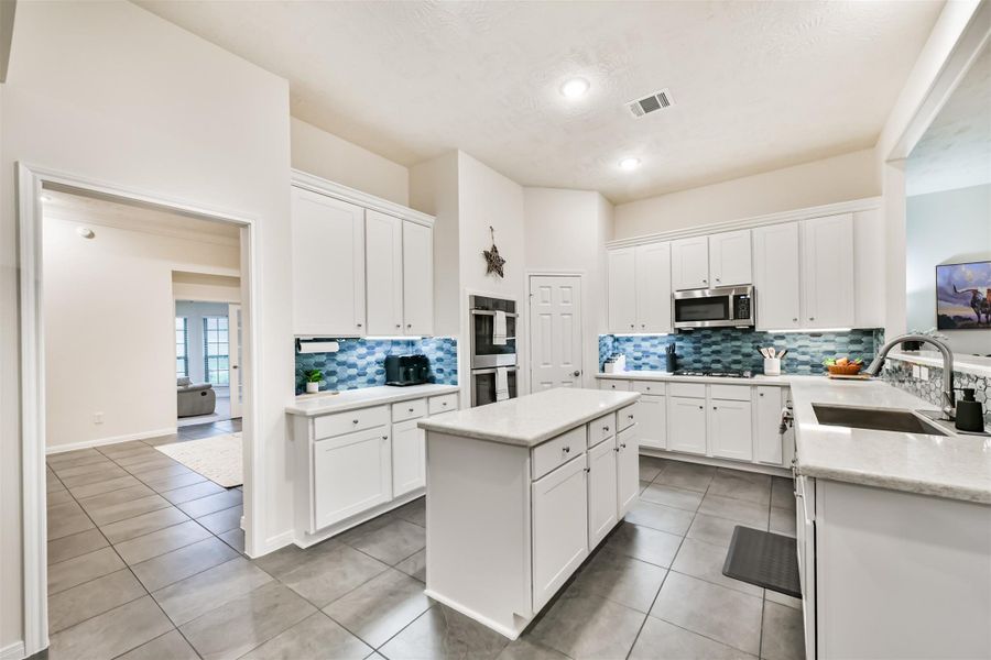 Furnished interior view inside a new home in , League City (Image 32).