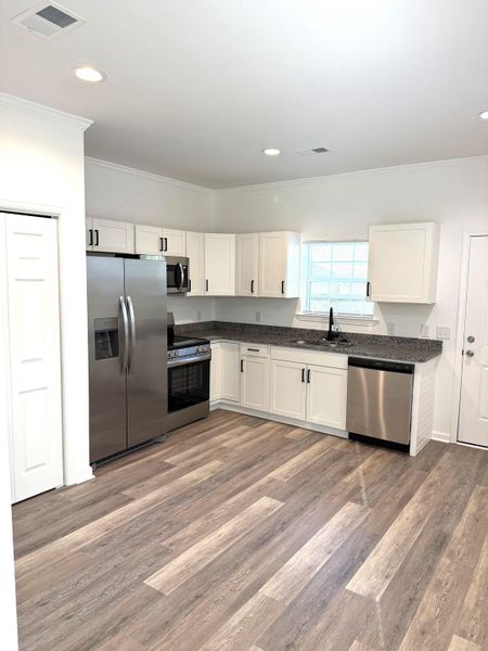 Furnished interior view inside a new home in , North Charleston (Image 9).