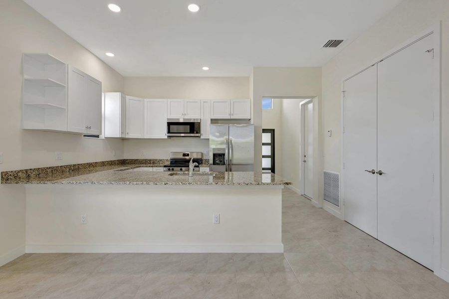 Furnished interior view inside a new home in , Indiantown (Image 3).
