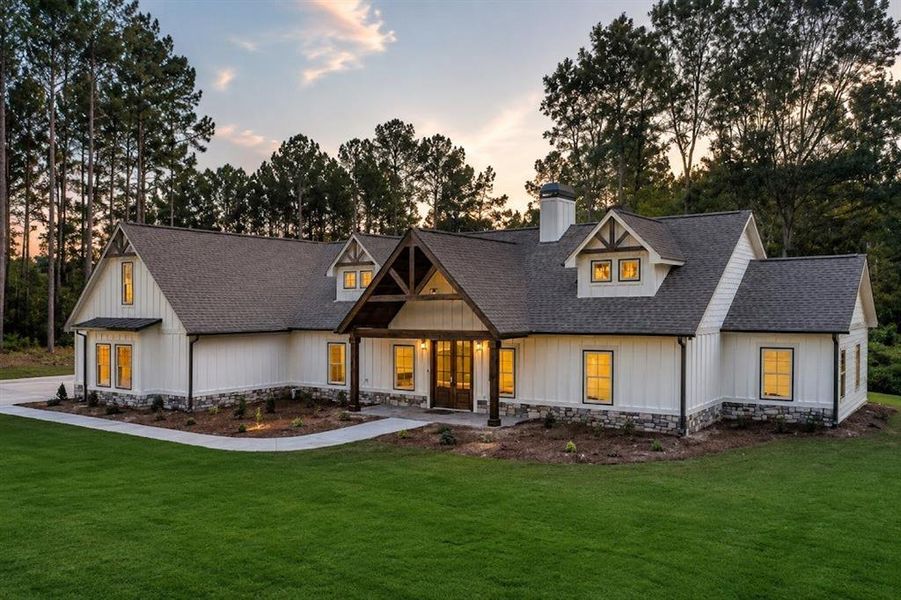 Front exterior of a new home in , Carrollton, GA, highlighting curb appeal (Image 31).