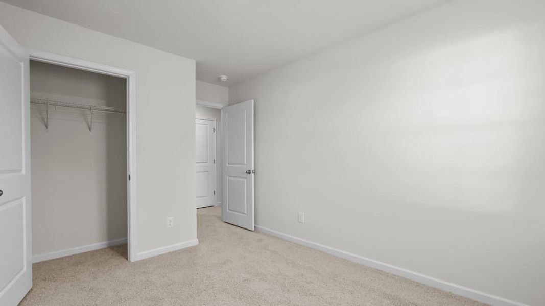 Spacious, unfurnished interior of a new home in The Townes at Ridgewood Farms, Winterville (Image 34).