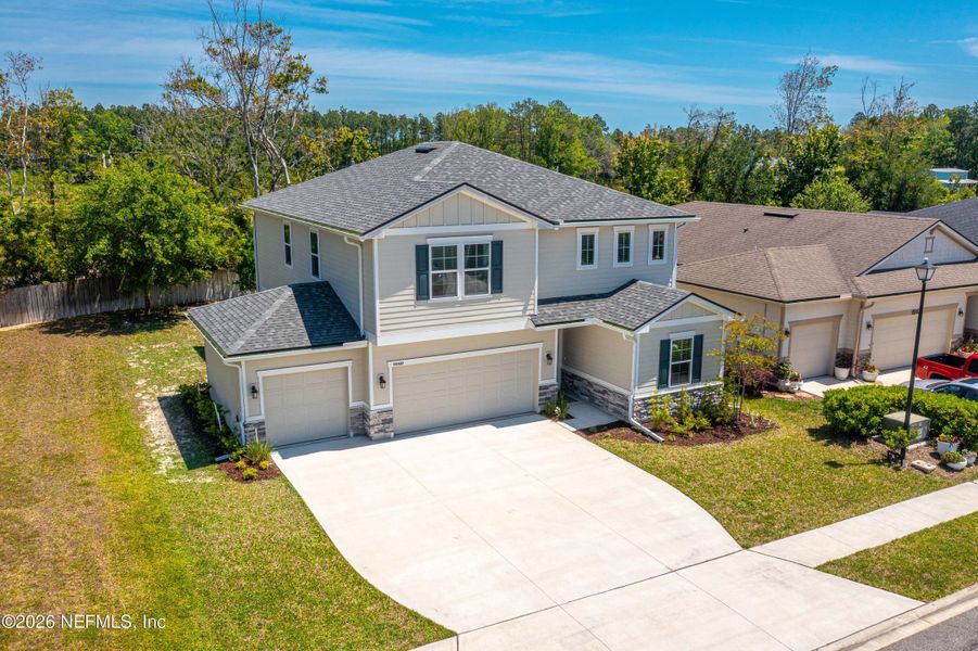 Front exterior of a new home in Woodbridge, Fernandina Beach, FL, highlighting curb appeal (Image 28).