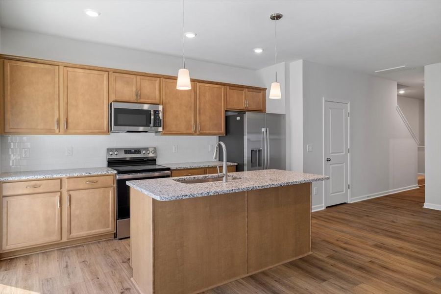 Furnished interior view inside a new home in West Main Townhomes, Sanford (Image 9).