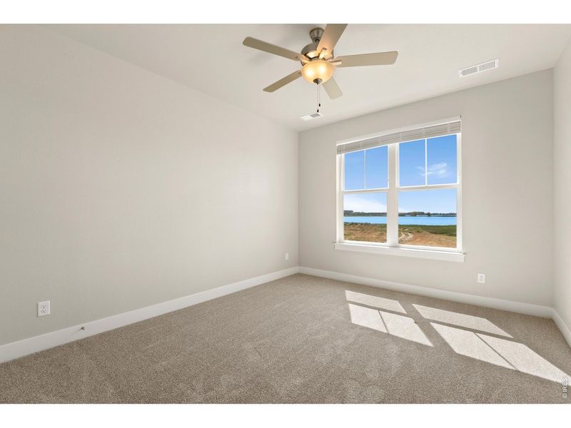 Spacious, unfurnished interior of a new home in The Lakes at Centerra, Loveland (Image 27).