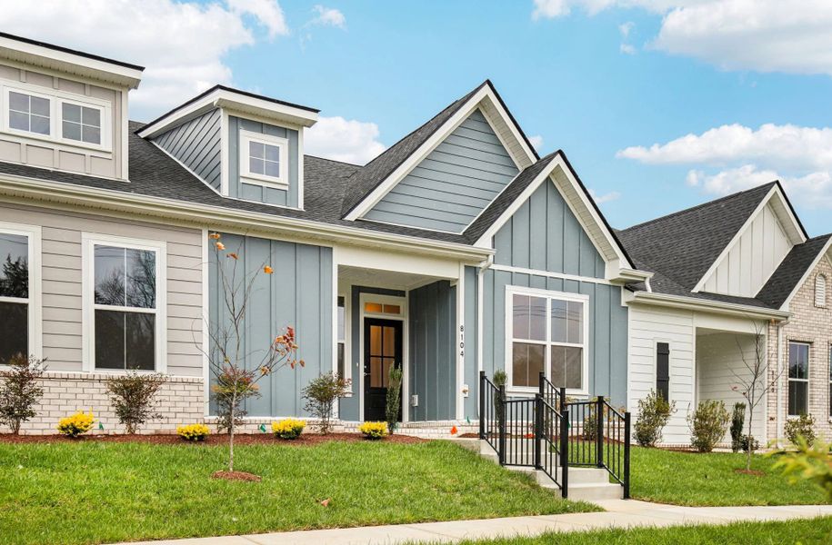 Front exterior of a new home in Stewart's Glen | 55+ Community, Smyrna, TN, highlighting curb appeal (Image 26). Front exterior of a new home in Stewart's Glen | 55+ Community, Smyrna, TN, highlighting curb appeal (Image 26).