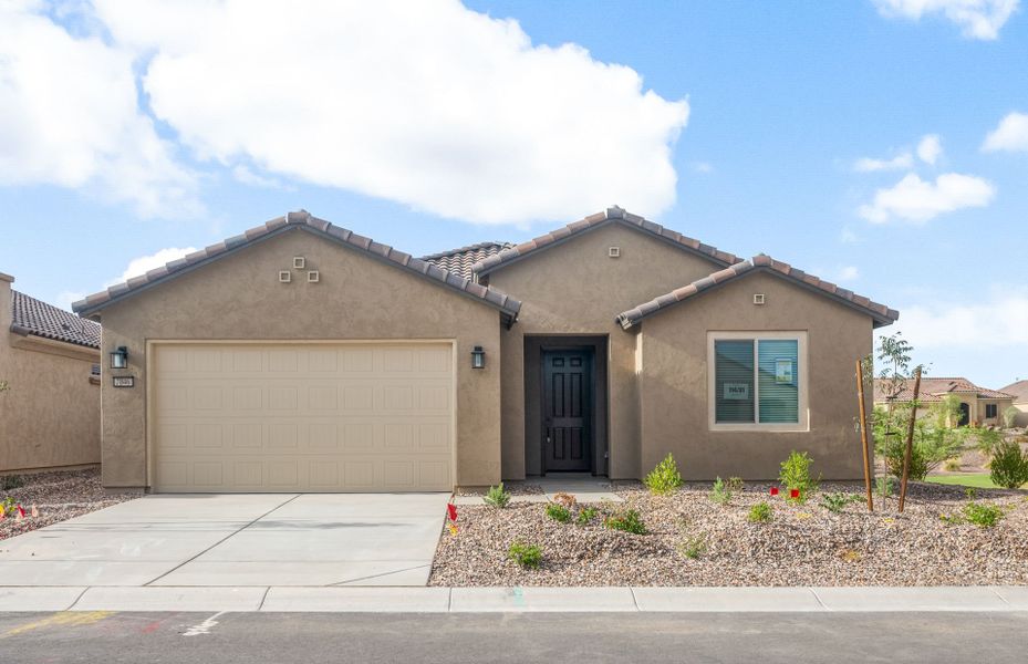 Front exterior of a new home in Sun City Anthem at Merrill Ranch, Florence, AZ, highlighting curb appeal (Image 2).
