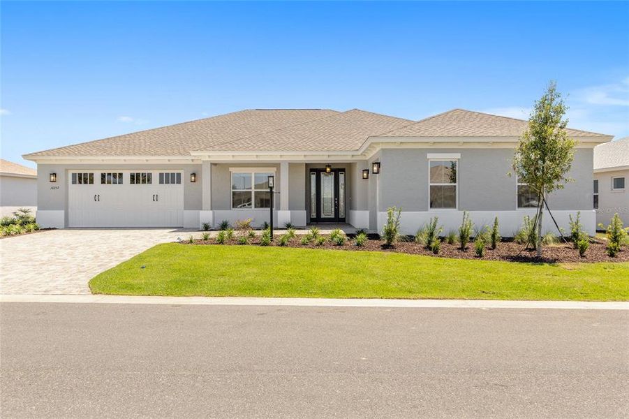 Front exterior of a new home in , Ocala, FL, highlighting curb appeal (Image 21). Front exterior of a new home in , Ocala, FL, highlighting curb appeal (Image 21).