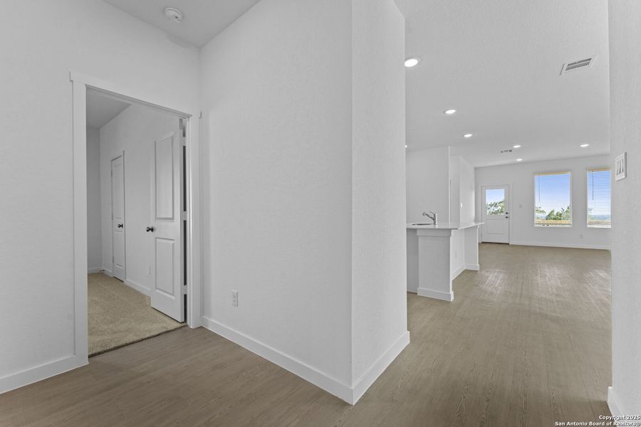 Spacious, unfurnished interior of a new home in Waterwheel: Coastline Collection, San Antonio (Image 24).