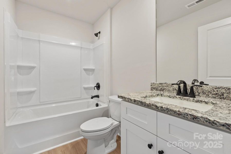 Furnished interior view inside a new home in Stagecoach Station, Gastonia (Image 7).