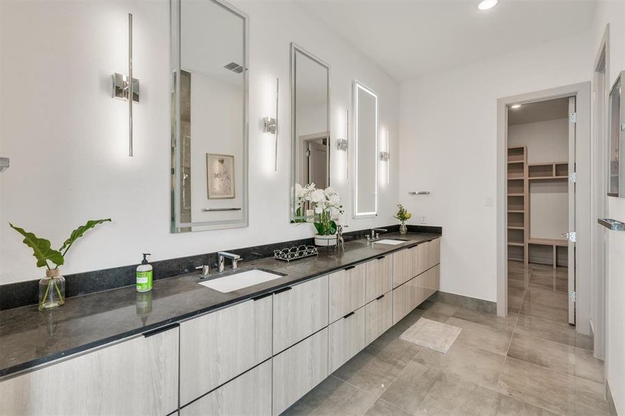 Bathroom with vanity and tile patterned floors