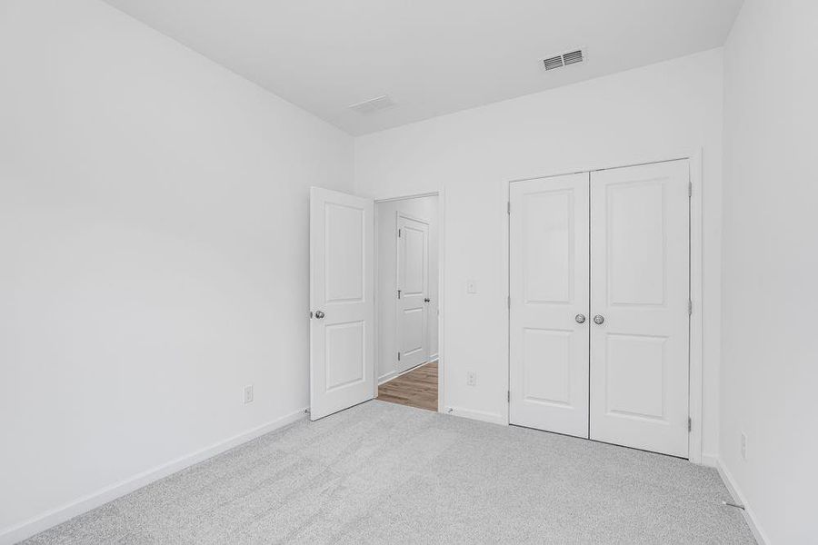 Spacious, unfurnished interior of a new home in Windance Lake, Loganville (Image 36).