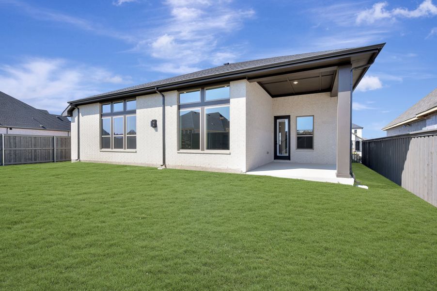 Exterior details and patio area of a home in Goodland – Manor Series, Grand Prairie (Image 4).
