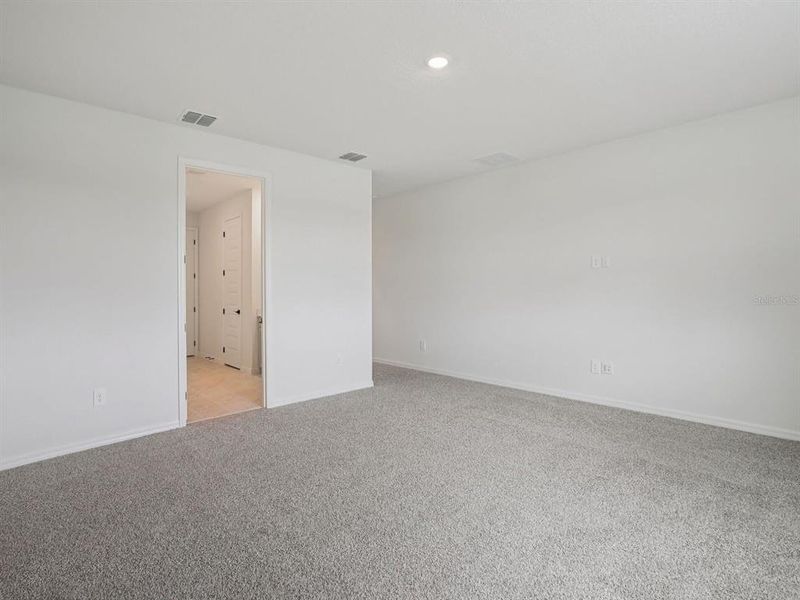 Spacious, unfurnished interior of a new home in Oakfield Trails - Signature Series, Parrish (Image 12).