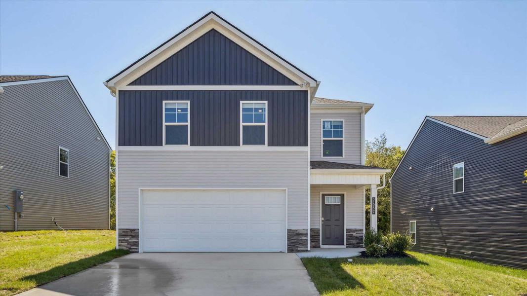 Front exterior of a new home in Belhaven, Knoxville, TN, highlighting curb appeal (Image 1).