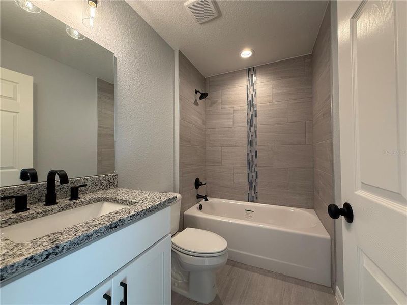 Furnished interior view inside a new home in , Dunnellon (Image 3).