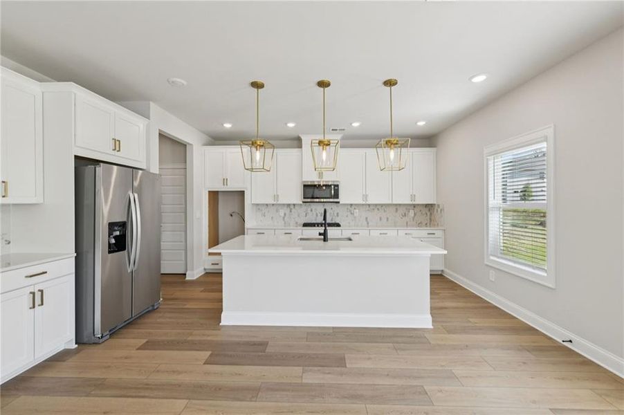 Furnished interior view inside a new home in Vines at Mill Creek - Estate Series, Braselton (Image 10).