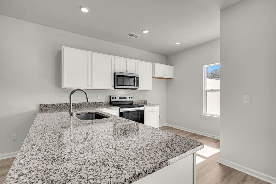 Furnished interior view inside a new home in Lakeview Commons, Goose Creek (Image 18).