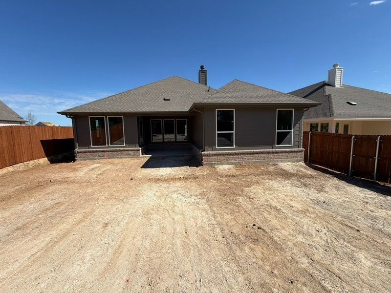 Exterior details and patio area of a home in Waterford Park, Weatherford (Image 3).