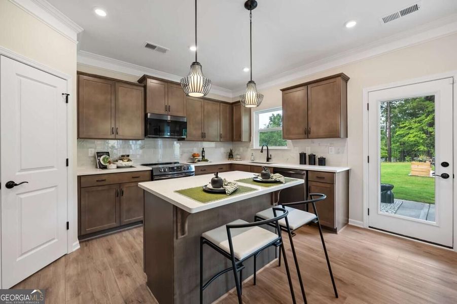 Furnished interior view inside a new home in Cobblestone Crossing Commons, Byron (Image 9).