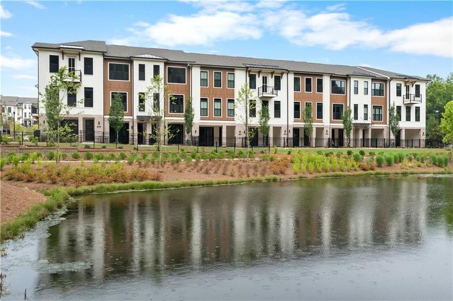 Welcome to Ecco Park and homesite 34 - Benton 3 BR Interior unit that faces the eco pond and wooded walking trail.