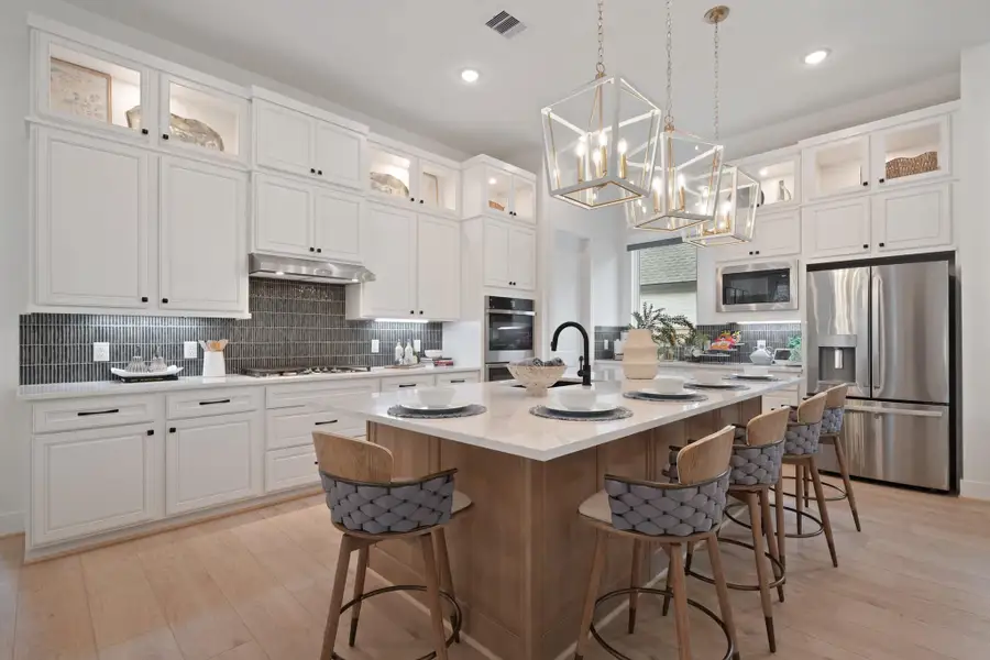 Representative furnished interior of a home built from the Hampton by Chesmar Homes in Parkside on the River, Georgetown (Image 6). Representative furnished interior of a home built from the Hampton by Chesmar Homes in Parkside on the River, Georgetown (Image 6).
