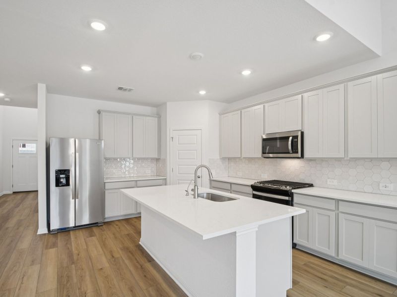 Furnished interior view inside a new home in Riverbend at Double Eagle - Boulevard Collection, Cedar Creek (Image 3).