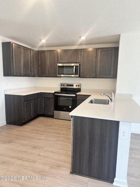 Furnished interior view inside a new home in Rookery, Green Cove Springs (Image 5).