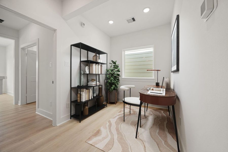 Nestled away upstairs is the home office. Featuring high ceilings, neutral paint, vinyl plank flooring, recessed lighting and large windows with privacy blinds. Nestled away upstairs is the home office. Featuring high ceilings, neutral paint, vinyl plank flooring, recessed lighting and large windows with privacy blinds.