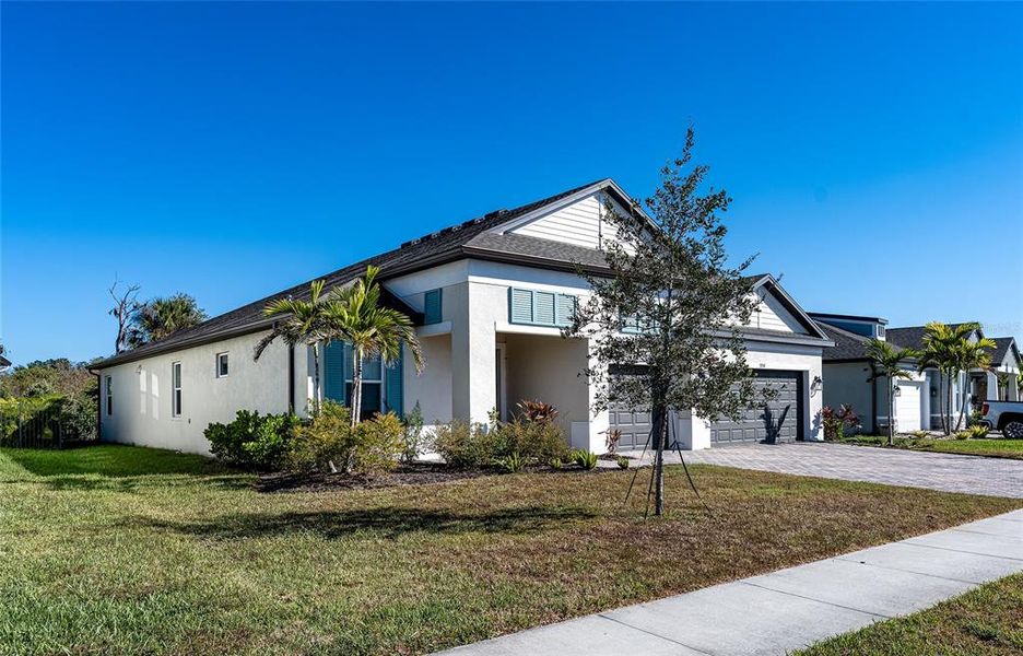 Front exterior of a new home in , Palmetto, FL, highlighting curb appeal (Image 28).