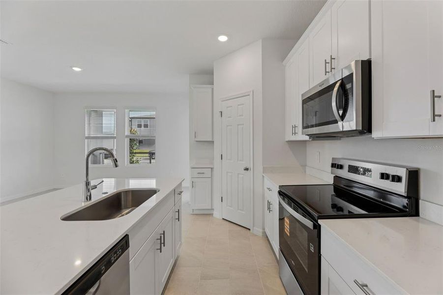 Furnished interior view inside a new home in The Meadow at Crossprairie Bungalows, St. Cloud (Image 12).