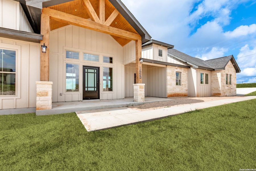 Exterior details and patio area of a home in , La Vernia (Image 28).