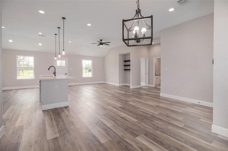 The dining area provides plenty of space for a sizable dining table and dining hutch so you can host fabulous dinner parties and holiday meals.