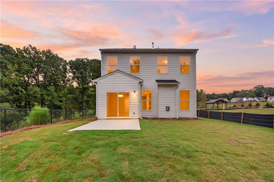 Exterior details and patio area of a home in Villas at Dawsonville, Dawsonville (Image 3).